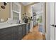 Chic bar area with gray cabinetry, marble countertop, and a sleek beverage cooler at 4015 Wieuca Ne Rd, Atlanta, GA 30342