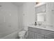 Elegant bathroom featuring subway tile, and marble countertop at 4015 Wieuca Ne Rd, Atlanta, GA 30342