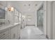 Well-lit bathroom with dual vanity, a spacious shower, and plenty of storage at 4015 Wieuca Ne Rd, Atlanta, GA 30342