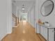 Bright hallway features hardwood floors, crisp white trim, and modern pendant lighting at 4015 Wieuca Ne Rd, Atlanta, GA 30342