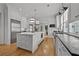 Spacious kitchen boasts a large island, stainless appliances, and ample natural light at 4015 Wieuca Ne Rd, Atlanta, GA 30342