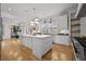 Bright kitchen with island, stainless appliances, and hardwood flooring at 4015 Wieuca Ne Rd, Atlanta, GA 30342