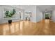 Bright, open living room with hardwood floors and access to outdoor living spaces at 4015 Wieuca Ne Rd, Atlanta, GA 30342