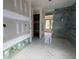 Bathroom showcasing marble tile flooring and walk-in shower at 101 Deer Canyon Dr, Auburn, GA 30011