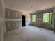 Bedroom featuring newly installed windows, providing natural light and views at 101 Deer Canyon Dr, Auburn, GA 30011