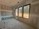 Bright bedroom features three large windows, offering ample natural light and picturesque views at 101 Deer Canyon Dr, Auburn, GA 30011