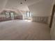 Bonus room featuring multiple windows, providing natural light and views at 101 Deer Canyon Dr, Auburn, GA 30011