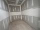 Spacious walk-in closet with ample space for storage and organization at 101 Deer Canyon Dr, Auburn, GA 30011