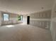 A spacious living room showing windows and natural light at 101 Deer Canyon Dr, Auburn, GA 30011