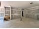 Spacious living room with stair access, ready for personalization at 101 Deer Canyon Dr, Auburn, GA 30011