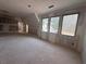 Spacious unfinished living room with three large windows at 101 Deer Canyon Dr, Auburn, GA 30011