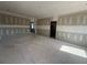 An empty living room space that shows access to other rooms at 101 Deer Canyon Dr, Auburn, GA 30011