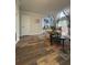 Open-concept living room with hardwood floors and sliding glass doors to a patio at 3414 Bayshore Dr, Atlanta, GA 30340