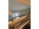 Upstairs view with a piano and natural light from a window at 3414 Bayshore Dr, Atlanta, GA 30340