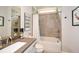 Bathroom with tub, shower, vanity, and decorative accents at 422 Laurel Spring Ct, Canton, GA 30114
