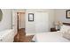 Bedroom with wood floors, queen bed and lots of natural light at 422 Laurel Spring Ct, Canton, GA 30114