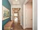 Inviting foyer showcasing hardwood floors and a modern accent wall at 422 Laurel Spring Ct, Canton, GA 30114