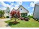 Attractive home exterior showcasing a well-maintained lawn and mature landscaping at 422 Laurel Spring Ct, Canton, GA 30114