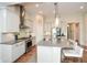 Spacious kitchen featuring white cabinets and stainless steel appliances at 422 Laurel Spring Ct, Canton, GA 30114
