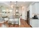 Bright open-concept kitchen with granite counters and stainless steel appliances at 422 Laurel Spring Ct, Canton, GA 30114