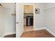 Spacious laundry room with upper cabinets and modern appliances at 422 Laurel Spring Ct, Canton, GA 30114