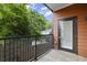Balcony with a view of lush greenery, offering a peaceful outdoor living space at 525 Parkway Ne Dr # 110, Atlanta, GA 30354