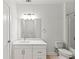Bright bathroom featuring a vanity with a modern countertop and a shower/tub combo at 525 Parkway Ne Dr # 110, Atlanta, GA 30354