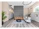 Elegant lobby with a leather couch, seating, modern rug and lighting, and package lockers at 525 Parkway Ne Dr # 110, Atlanta, GA 30354