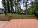 Wooden back deck with railing at 5307 Red Rock Trce, Powder Springs, GA 30127