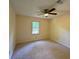 Bedroom featuring neutral walls, carpet, and a window offering natural light at 5307 Red Rock Trce, Powder Springs, GA 30127