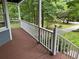 Enjoy the view from this covered porch at 5307 Red Rock Trce, Powder Springs, GA 30127