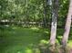 Lush backyard offering plenty of space for outdoor activities and entertaining at 5307 Red Rock Trce, Powder Springs, GA 30127