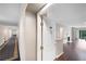 Inviting entryway featuring hardwood floors and a view into the living area with a fireplace at 1312 Pine Heights Ne Dr, Atlanta, GA 30324