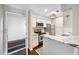 Well-lit kitchen featuring granite countertops, stainless steel appliances, and white cabinetry at 1312 Pine Heights Ne Dr, Atlanta, GA 30324