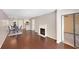 Spacious room featuring a fireplace, dining area, and sliding glass doors that lead to the outdoor at 1312 Pine Heights Ne Dr, Atlanta, GA 30324