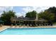 Sparkling community pool with lounge chairs perfect for relaxing in the sun at 1312 Pine Heights Ne Dr, Atlanta, GA 30324