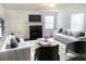 Elegant living room with fireplace, neutral color scheme, and stylish furnishings at 1754 Soapstone Ct, Decatur, GA 30034