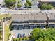 Aerial view of townhomes, showcasing parking, mature trees and landscaping at 281 Cherokee Ne St, Marietta, GA 30060