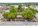 Aerial view of a city park with mature trees, gazebo, and surrounding buildings at 281 Cherokee Ne St, Marietta, GA 30060