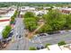 Overhead view of a city park with lush trees, walking paths and surrounding streets with buildings at 281 Cherokee Ne St, Marietta, GA 30060