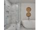 Bright bathroom featuring a glass-enclosed shower and a modern soaking tub with decorative wall art at 281 Cherokee Ne St, Marietta, GA 30060