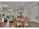 Dining room with hardwood floors and views of open living room with cozy fireplace at 281 Cherokee Ne St, Marietta, GA 30060