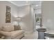 Upstairs hallway with comfortable seating and staircase at 281 Cherokee Ne St, Marietta, GA 30060