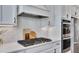 Gourmet kitchen features stainless steel appliances, gas range, and white subway tile backsplash at 281 Cherokee Ne St, Marietta, GA 30060