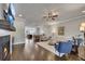 Open-concept living room boasts hardwood floors, fireplace, open kitchen, and a comfortable sitting area at 281 Cherokee Ne St, Marietta, GA 30060