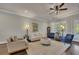 Inviting living room features comfortable seating, neutral decor, shutters, and hardwood floors at 281 Cherokee Ne St, Marietta, GA 30060
