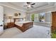 Spacious main bedroom with tray ceiling, neutral colors, and ample natural light from large windows at 281 Cherokee Ne St, Marietta, GA 30060