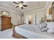 Comfortable main bedroom with a bed and an adjoining bathroom at 281 Cherokee Ne St, Marietta, GA 30060