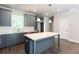 New kitchen features gray cabinets, quartz countertops, and stainless steel appliances at 3352 Landings South Dr, Atlanta, GA 30331