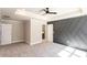 Main bedroom features decorative wall, tray ceiling and fan at 3352 Landings South Dr, Atlanta, GA 30331